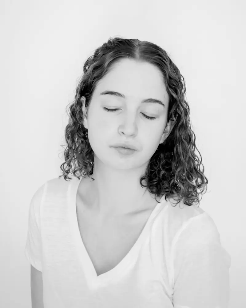 What hypnosis really feels like A relaxed woman with her eyes closed, showing what hypnosis really feels like