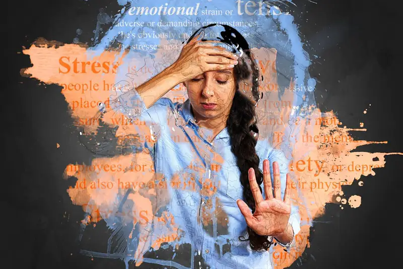 Stress management in Wallsend, Newcastle A stressed woman holding her head, illustrating stress management support in Wallsend, Newcastle upon Tyne